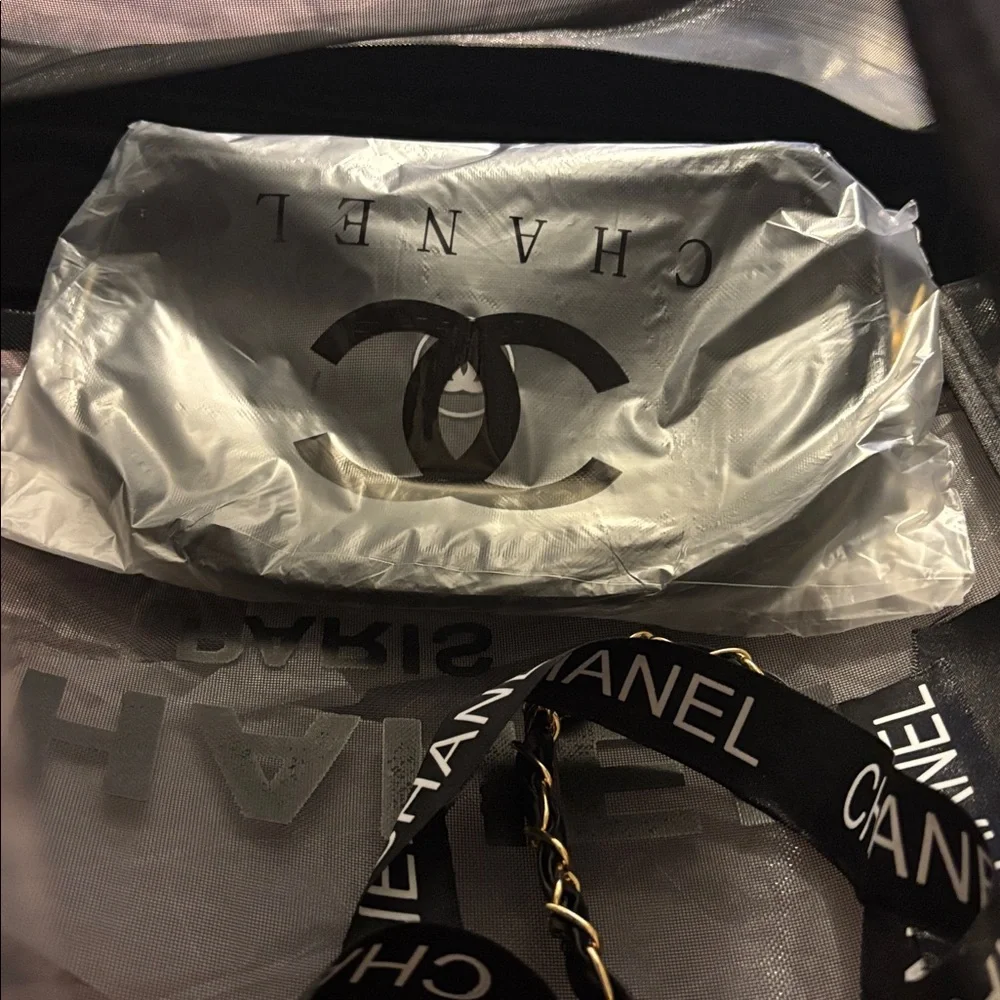 CHANEL Black Mesh Paris Tote with Matching Cosmetic Pouch